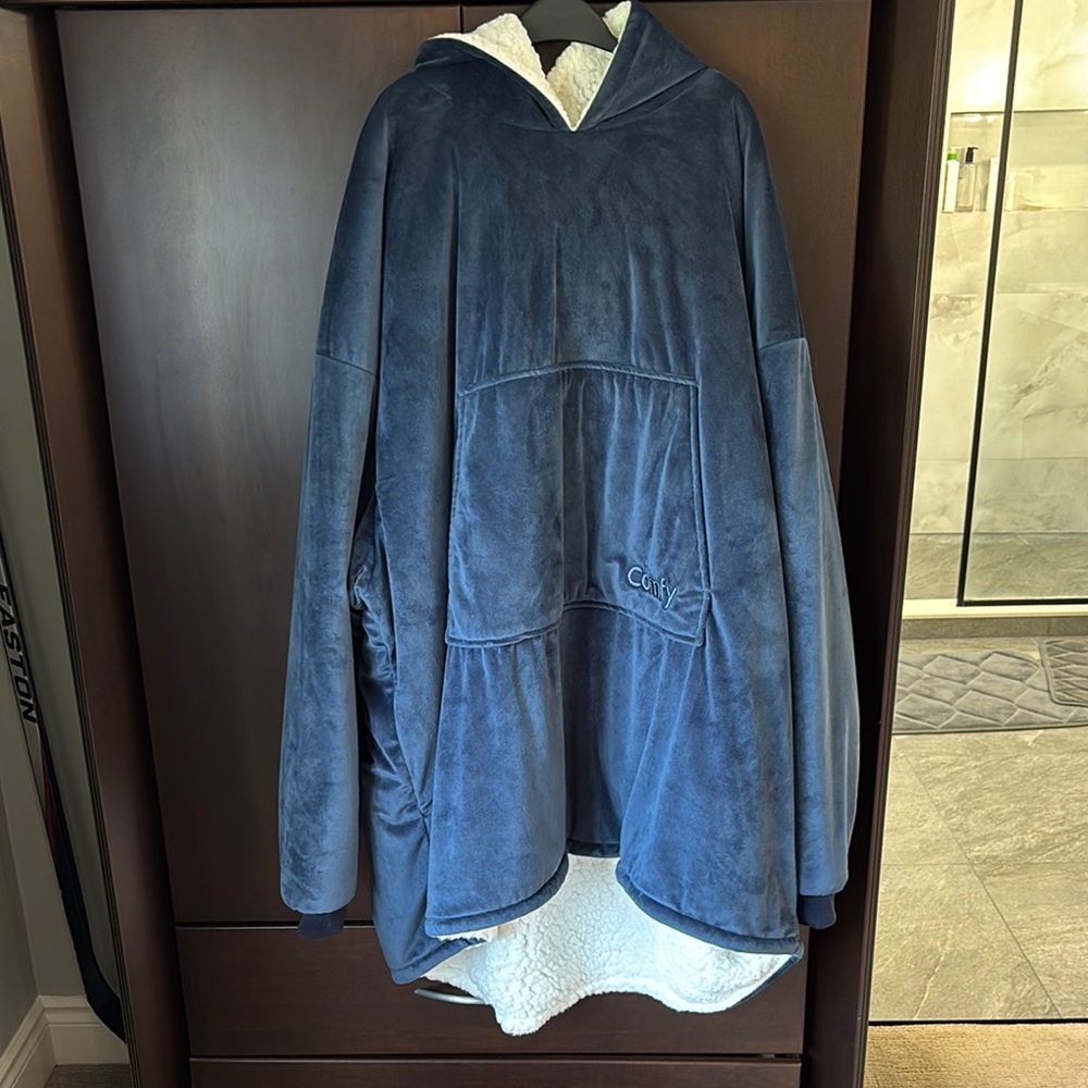 Like new, adult size The Comfy.
